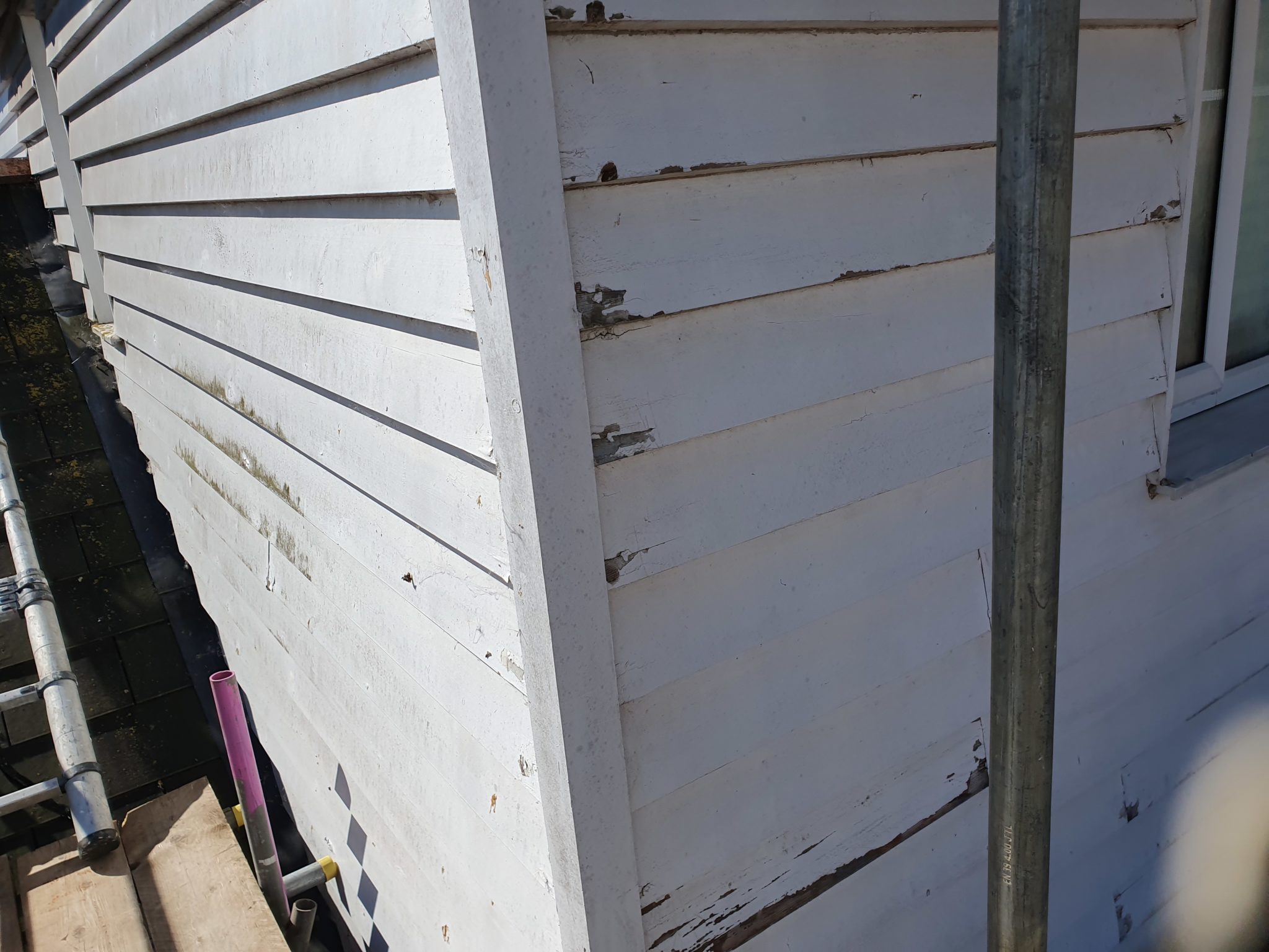 Weathered weatherboarding before painting