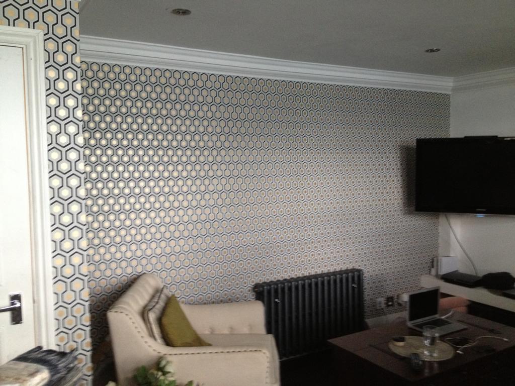 wallpapering paint over