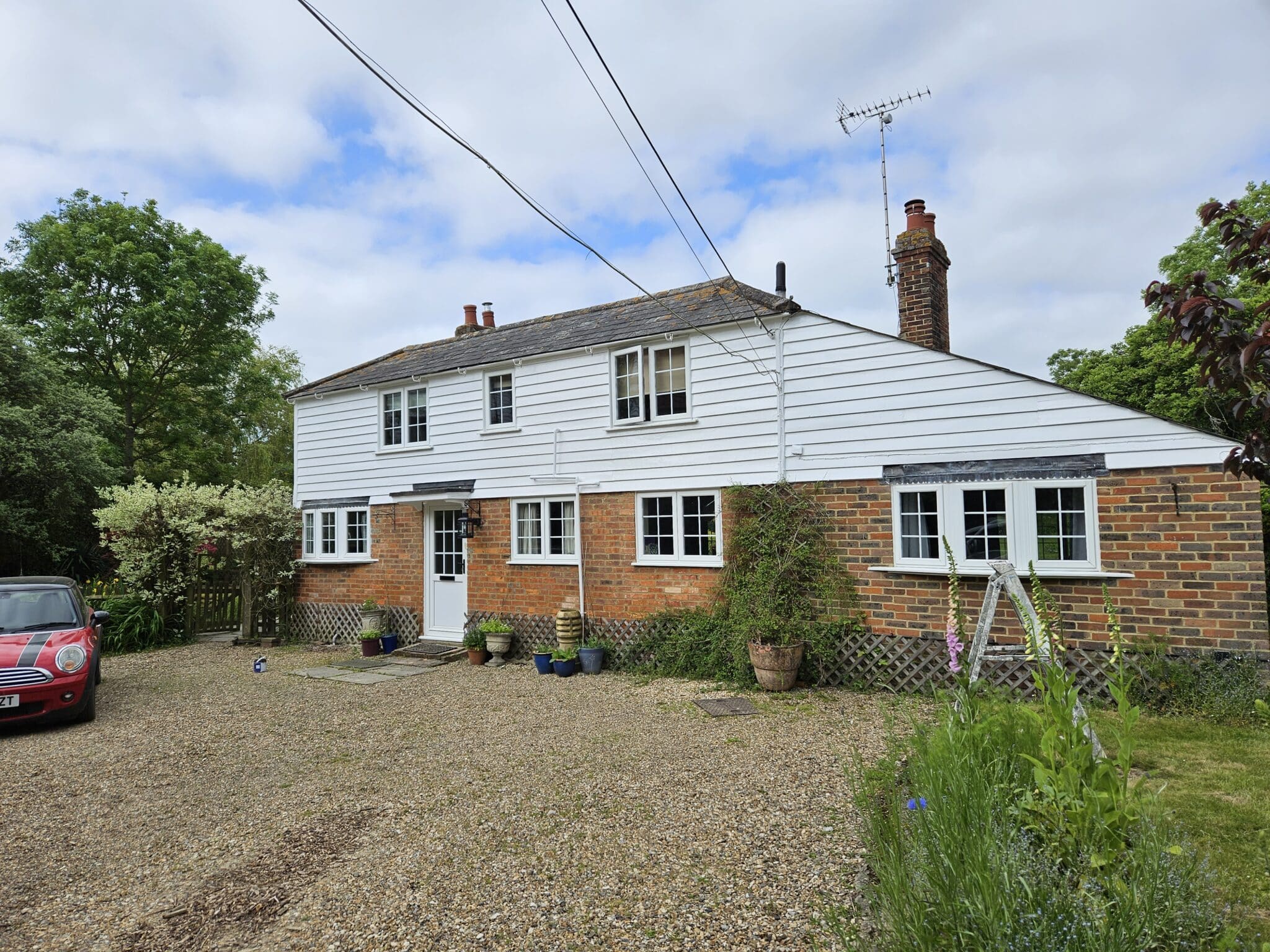 painting the exterior of a house in Maidstone